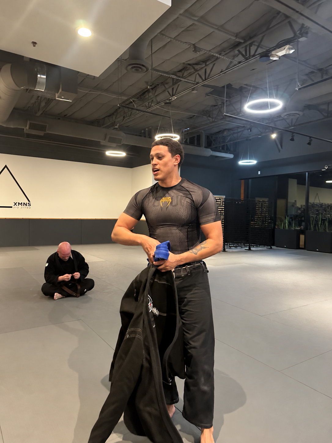 Cameron wearing his Venum rash guard at XMNS Brazilian Jiu Jitsu in Scottsdale, Arizona -- venum rash guard review
